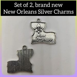5/$25- 2, brand new silver New Orleans charms w/ fleur de lis Louisiana state
